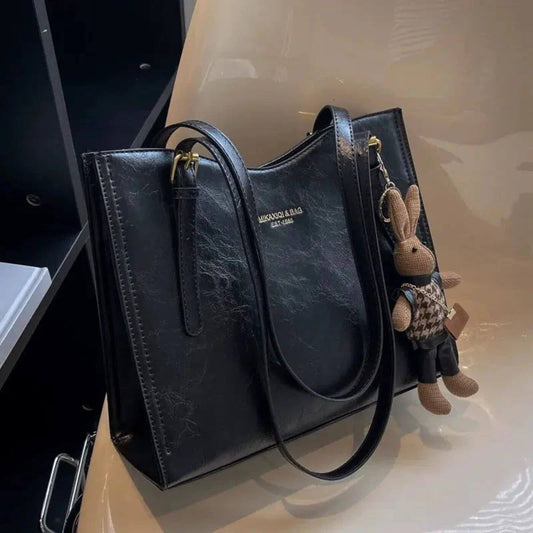 DouceOreille – Sac à bandoulière moelleux avec pendentif lapin